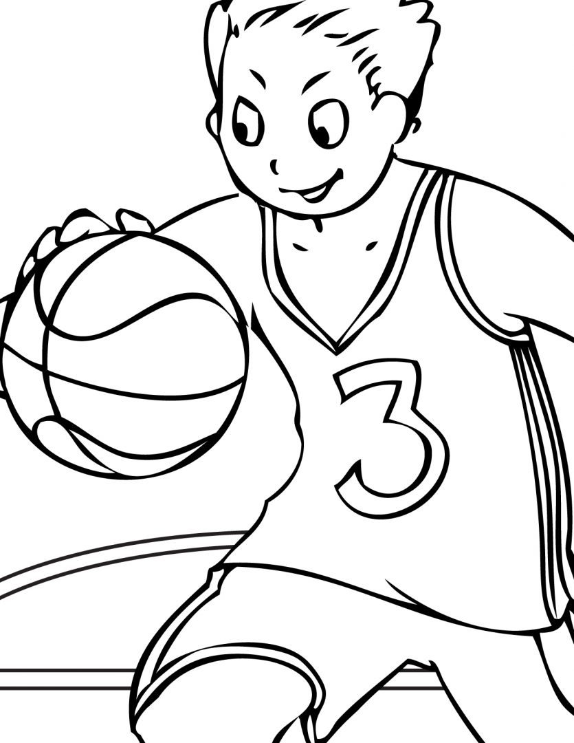 Niño jugando al baloncesto